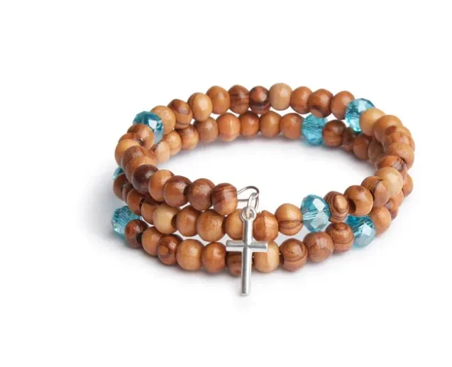 Handmade Wrap Around Olive Wood Bracelet With Light Blue Bead Detail With Silver Jerusalem Cross