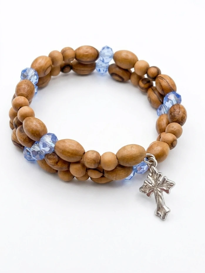 Handmade Wrap Around Olive Wood Bracelet With Light Blue Bead Detail With Silver Cross