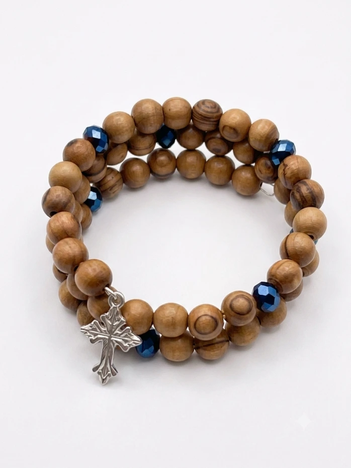 Handmade Wrap Around Olive Wood Bracelet With Dark Blue Bead Detail With Silver Cross